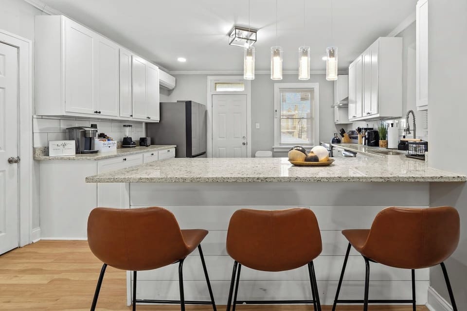 The chef's kitchen is fully stocked, perfect for preparing your favorite meals.
