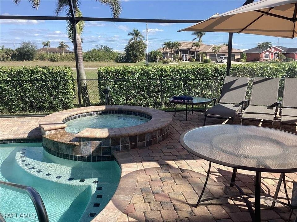 The salt water hot tub features jets and lighting, with seating for six adults. 