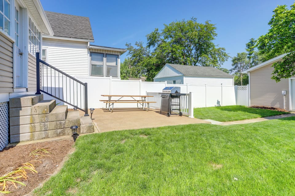 House Exterior | Patio | Picnic Table | Gas Grill | Fenced Backyard