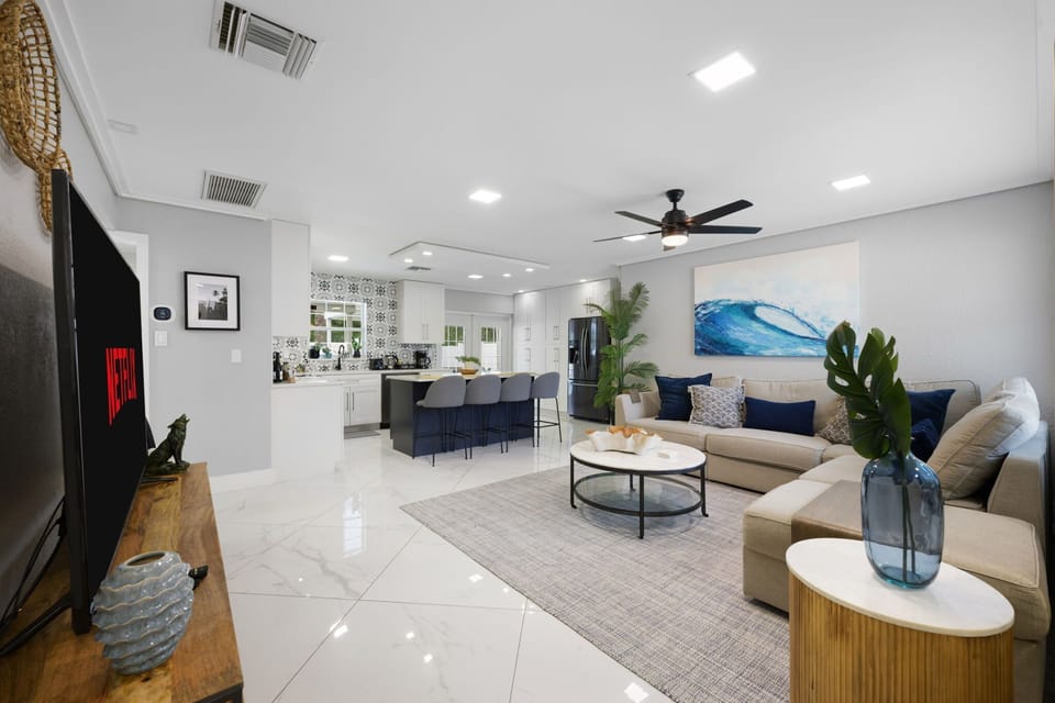 Enjoy the spacious open floor plan that seamlessly connects the living room, kitchen, and dining area—perfect for gathering, cooking, and relaxing together in style and comfort.

