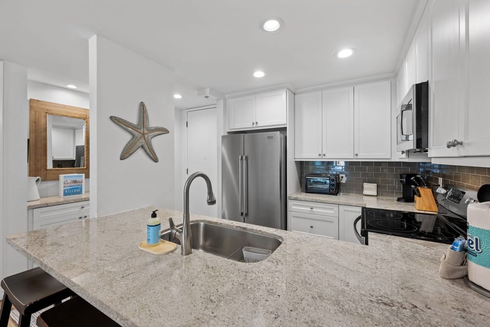 Enjoy a fully equipped kitchen perfect for preparing delicious meals during your stay.