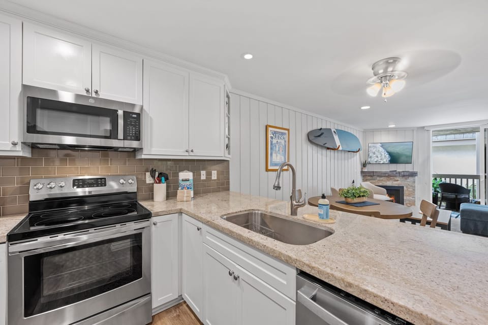 Enjoy cooking with top-of-the-line stainless steel appliances.