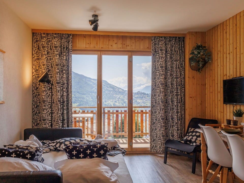 Interior Design, Furniture, Wood Stain, Curtain, Hardwood, Living Room, Window Treatment, Linens, Lamp, Wood Flooring
