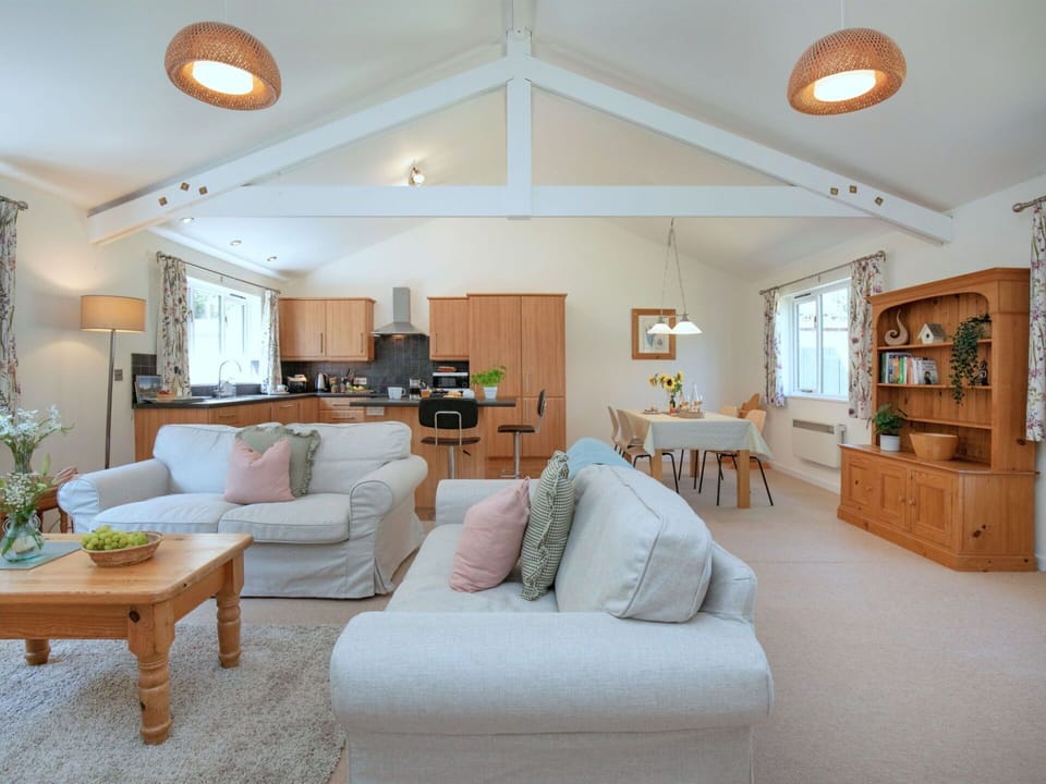Furniture, Interior Design, Wood, Ceiling, Couch, Flooring, Textile, Room, Floor, Lighting