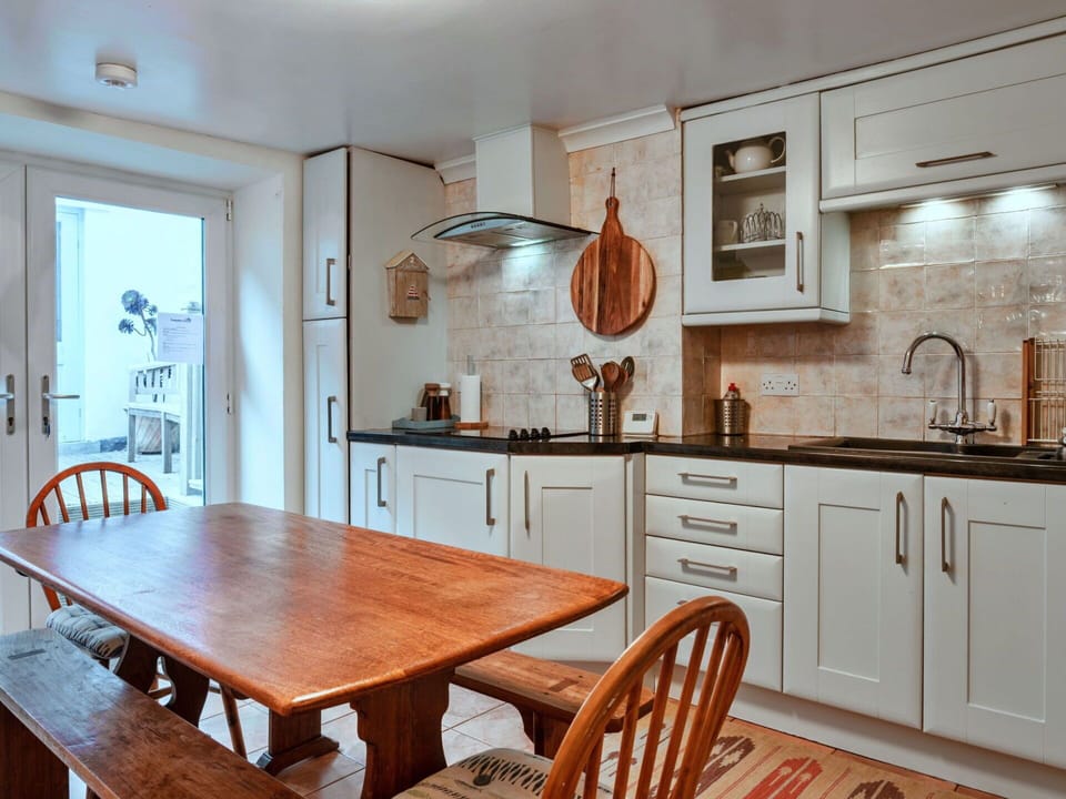 Furniture, Kitchen, Cabinetry, Interior Design, Flooring, Countertop, Wood, Kitchen Appliance, Major Appliance, Ceiling