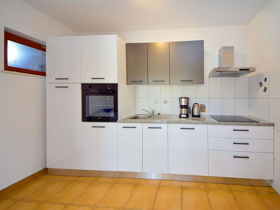 Kitchen, Kitchen Appliance, Countertop, Cabinetry, Major Appliance, Flooring, Wood, Interior Design, Floor, Home Appliance