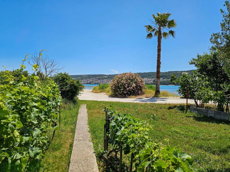 Sky, Blue, Body Of Water, Vegetation, Shrub, Landscape, Coastal And Oceanic Landforms, Coast, Bank