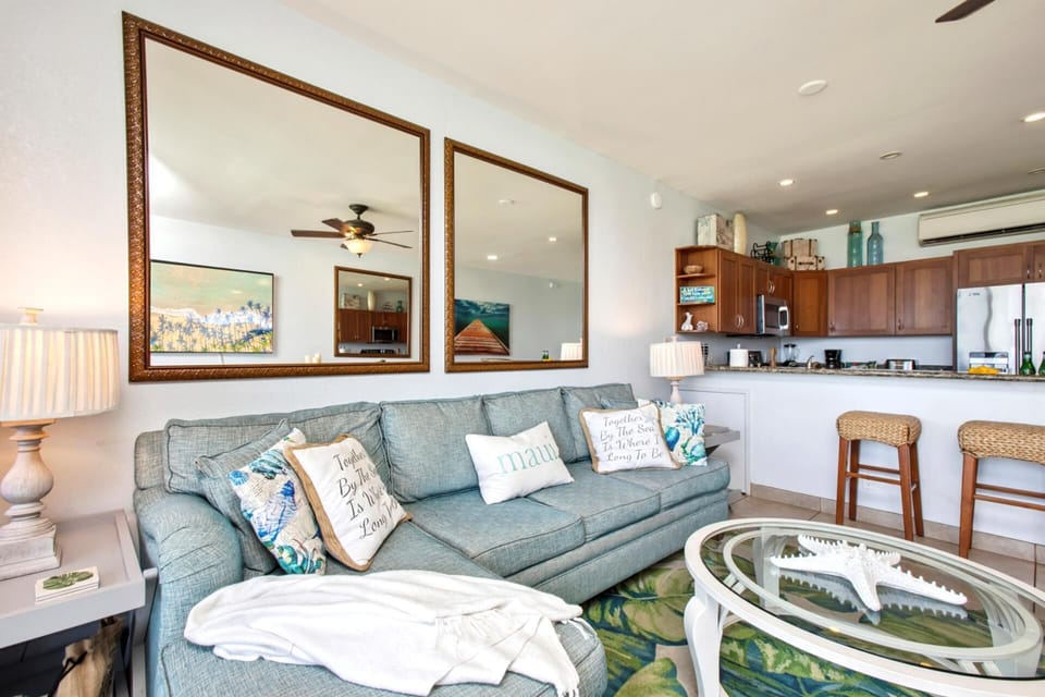 Comfortable open-plan living room with island touches