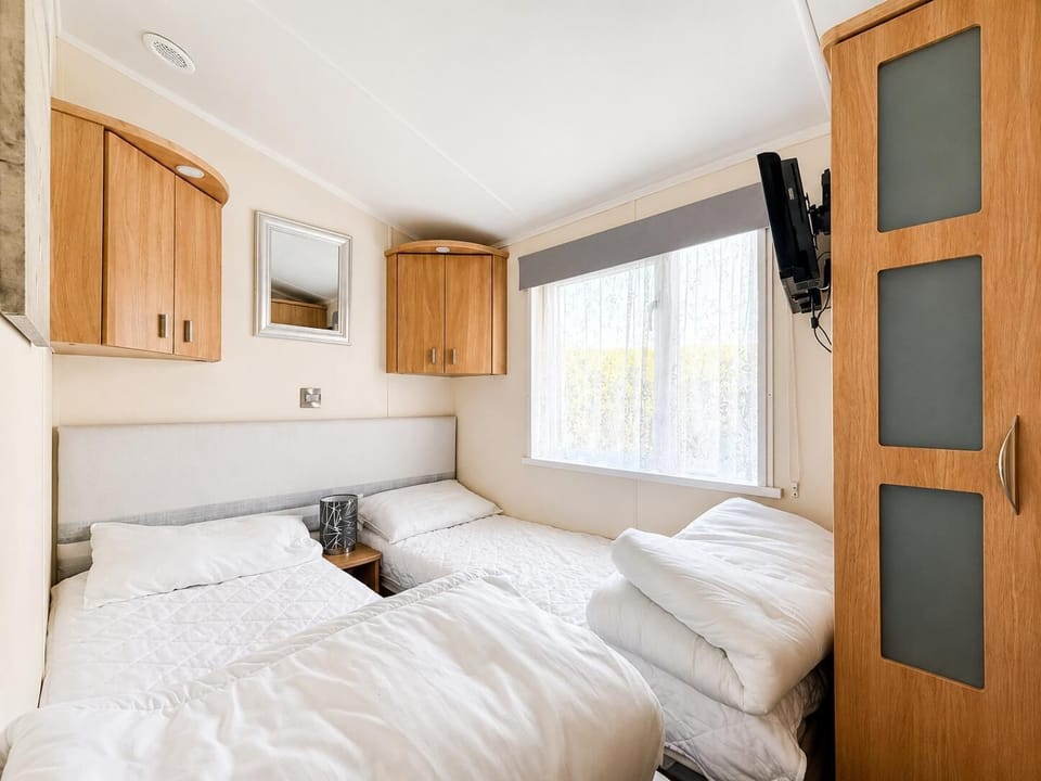 The twin room is perfect for the kids, let them unpack and make this room their own. They will love having their own space to retreat to when on holiday