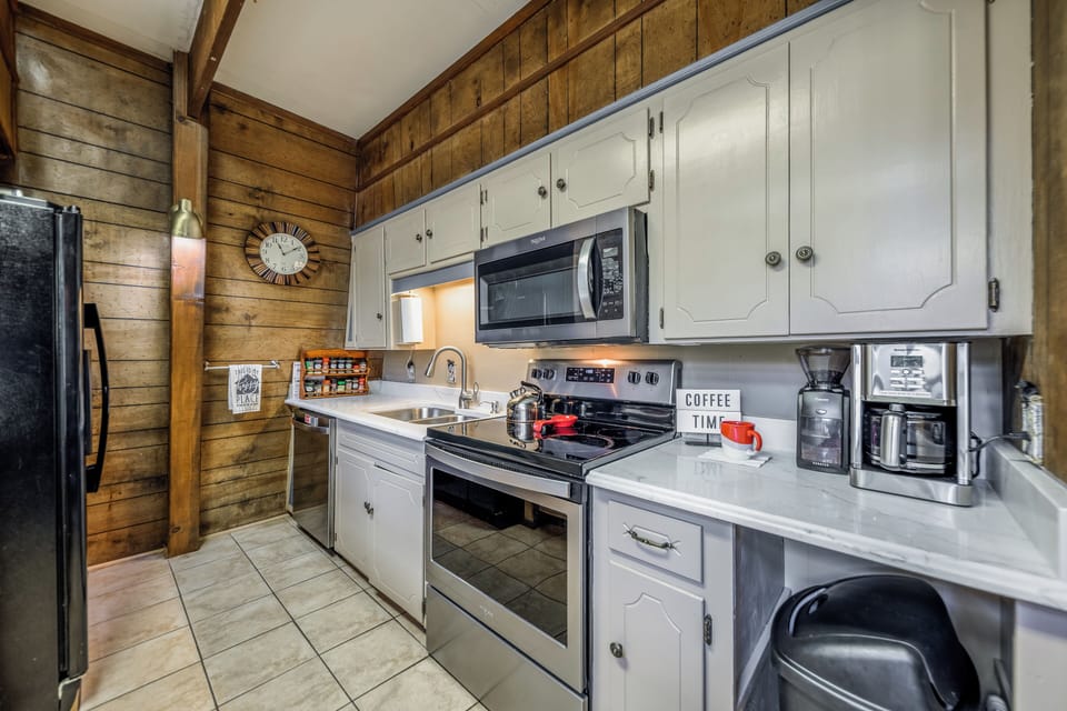 The kitchen comes complete with pots/pans, spices and gourmet coffee and tea.