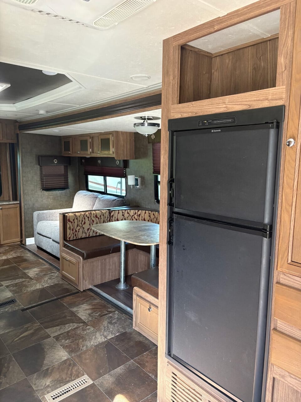 Everything you need, right where you need it—cook up your favorites with a full kitchen, full-size fridge, and a cozy dining table perfect for meals, games, or morning coffee