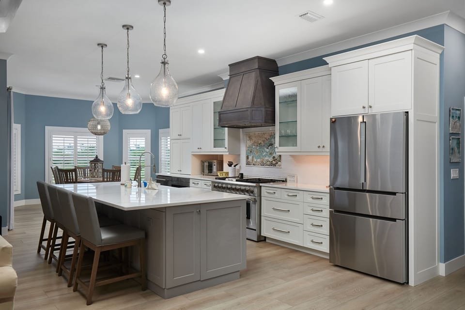 Beauty abounds in this executive class Beachview estate, featuring 4 bedrooms and baths, a heated pool/spa, and high end furniture and finishes