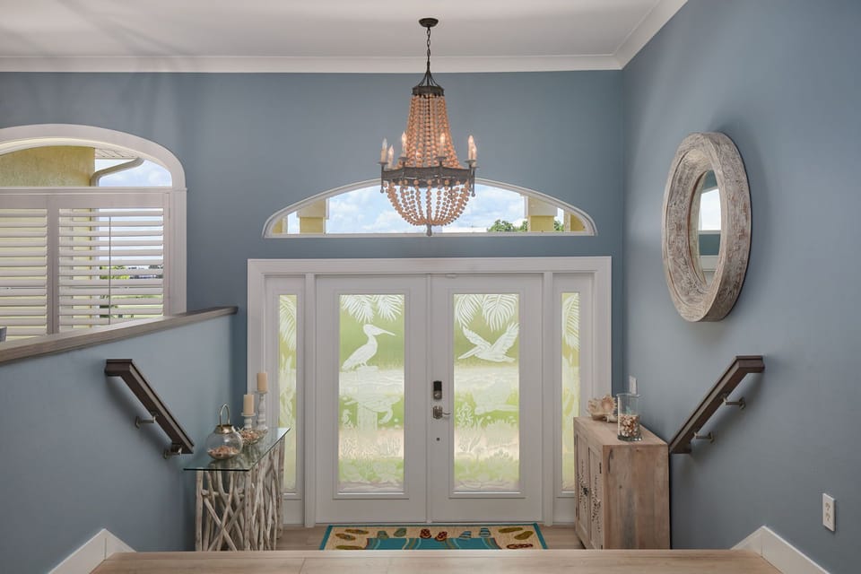 Beauty abounds in this executive class Beachview estate, featuring 4 bedrooms and baths, a heated pool/spa, and high end furniture and finishes
