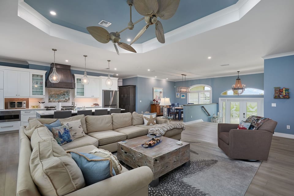 Beauty abounds in this executive class Beachview estate, featuring 4 bedrooms and baths, a heated pool/spa, and high end furniture and finishes