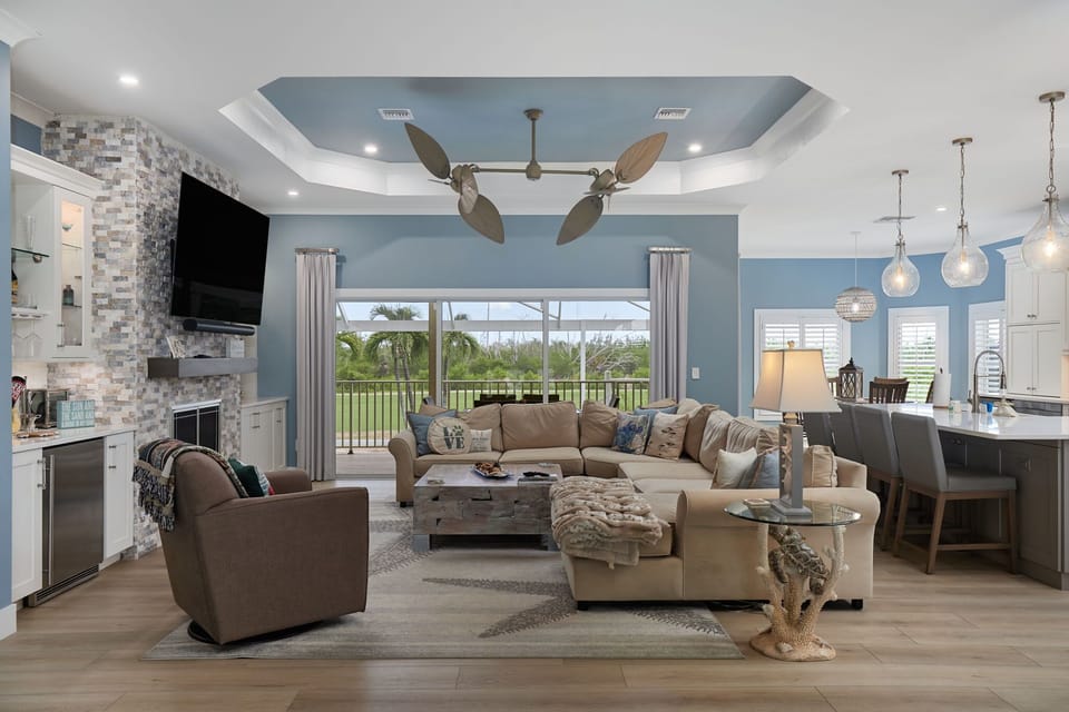 Beauty abounds in this executive class Beachview estate, featuring 4 bedrooms and baths, a heated pool/spa, and high end furniture and finishes