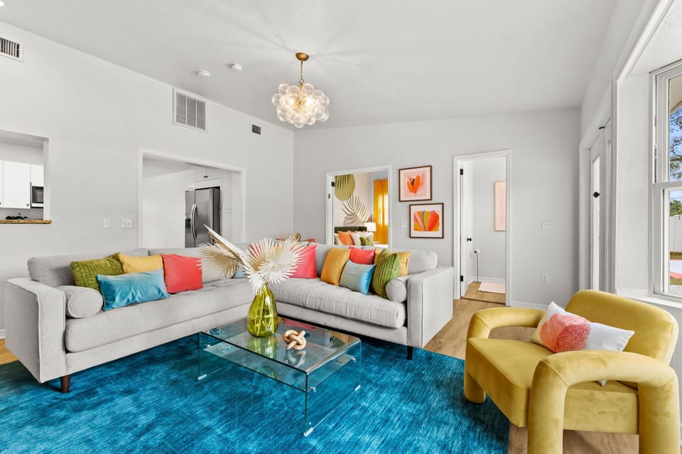 Soft, spacious, and oh-so-inviting—our living area offers plush seating for everyone.