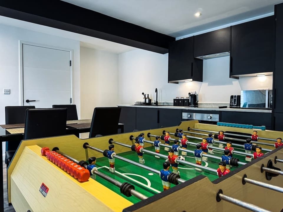 Dining Set, Full Football Table Game and Kitchen View 