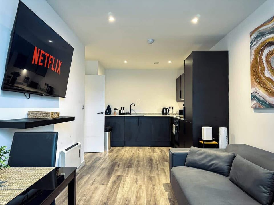 Living Room with a View of the Full Kitchen 