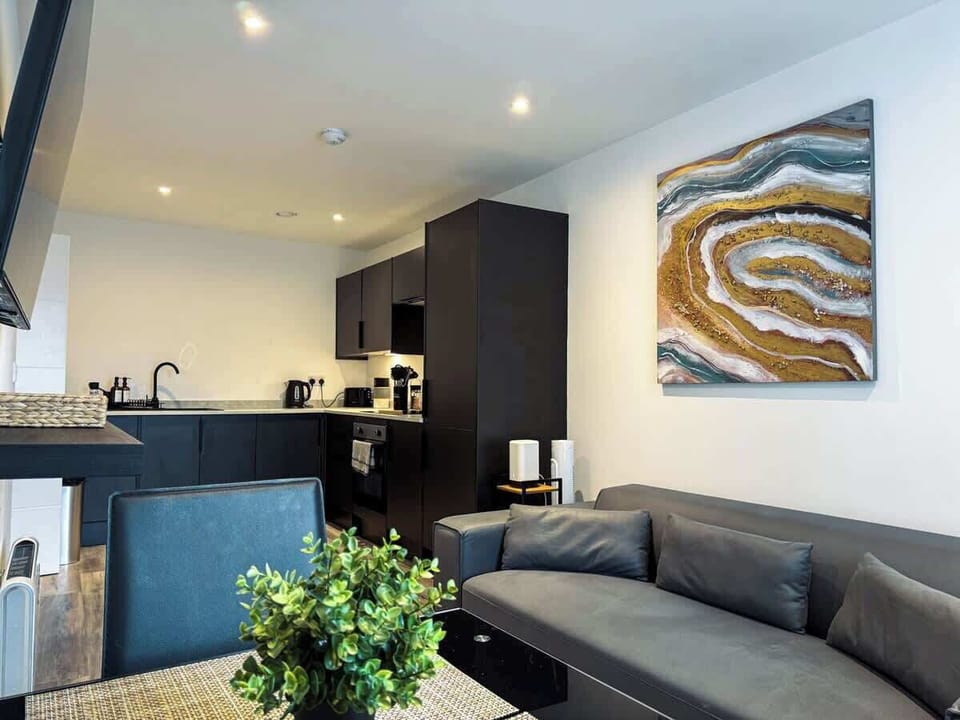 Decorative Detail with Sofa Bed and Kitchen View 