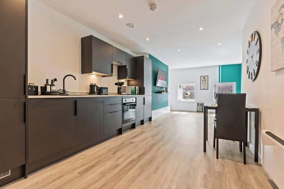 Fully Equipped Kitchen and Dining Room with Chairs