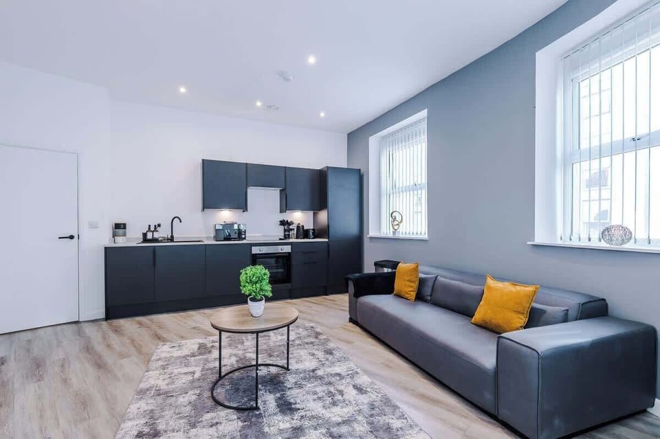 Open Plan Kitchen/Living Area with Sofa and Smart TV