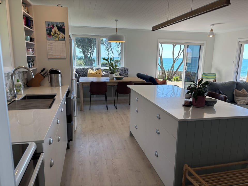 Open plan kitchen allows family friendly cooking.