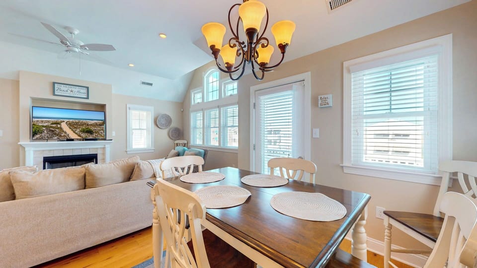 Dining space with seating for 4 for comfortable meals.