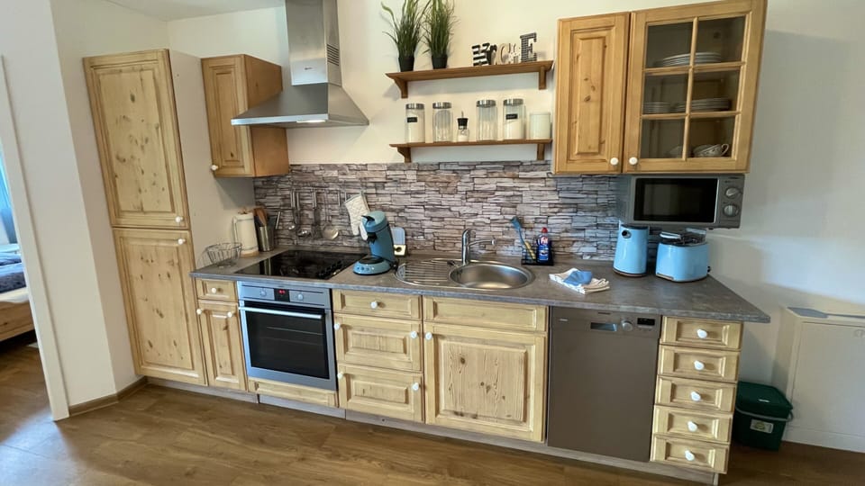 Well-equipped country-style kitchen.