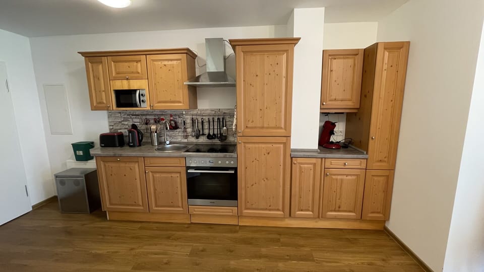 Well-equipped country-style kitchen.