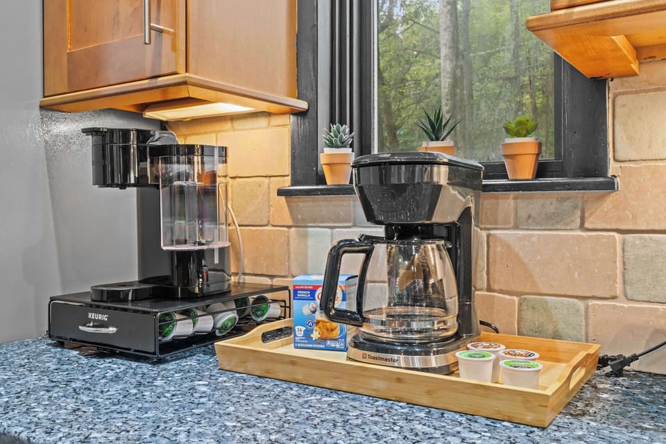Brew your morning coffee in style with modern appliances and serene views!