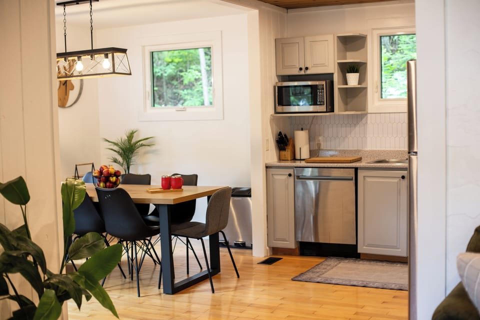 The kitchen and dining room are open to the living room.