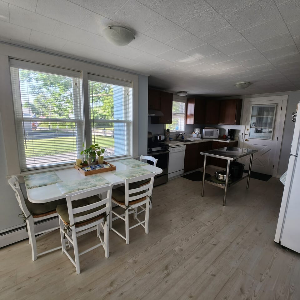 Dining Area with Harbor and Deck Views. Harbor View is to the left.
