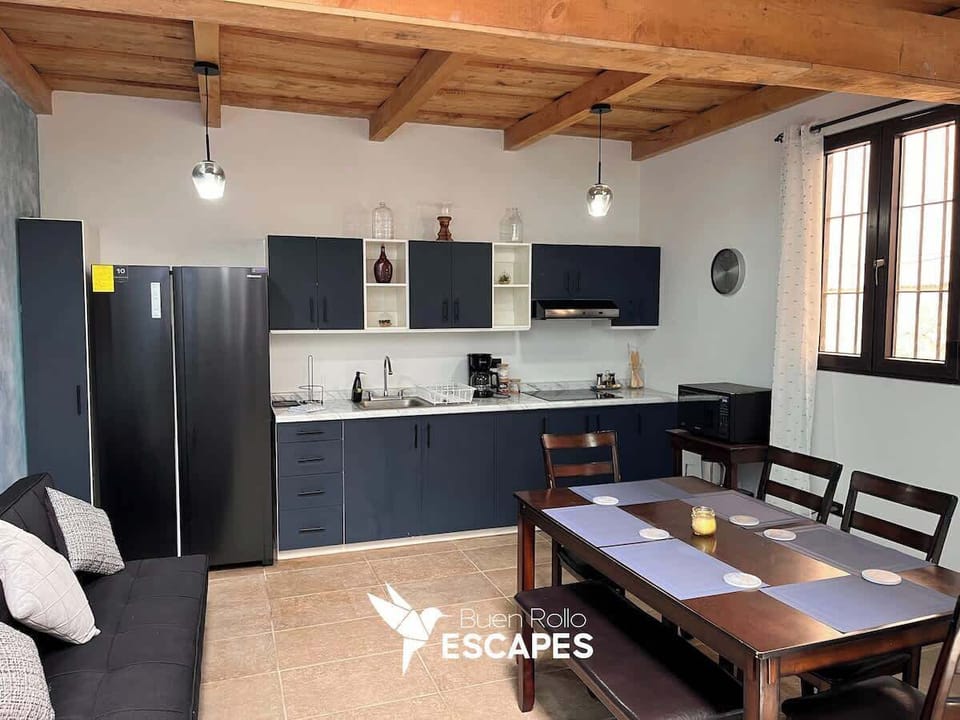 Spacious open kitchen and dining area fully available for your use.
You'll have access to all the essentials, including a blender, coffee machine, microwave, and other basic cooking equipment to prepare and enjoy meals comfortably.