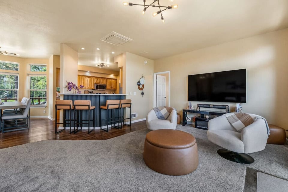 Stylish bar counter that connects seamlessly with the kitchen—ideal for casual dining or morning coffee with a view.