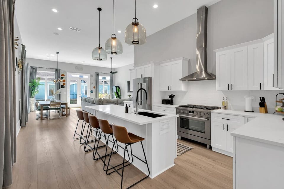 Fully-stocked kitchen with high-end Bosch appliances, including a large side-by-side fridge, gas stove & oven, microwave, and dishwasher.  Also featuring a toaster, electric kettle, Keurig & drip coffee makers, and cofee & tea!