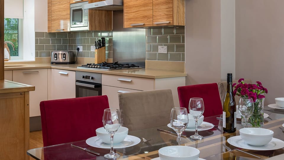 Gather at the dining table that seats eight for meals