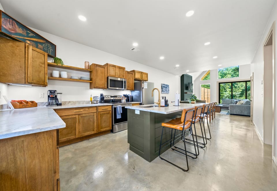 Room for everyone at the island! Whether you're prepping dinner or sharing breakfast, it works.