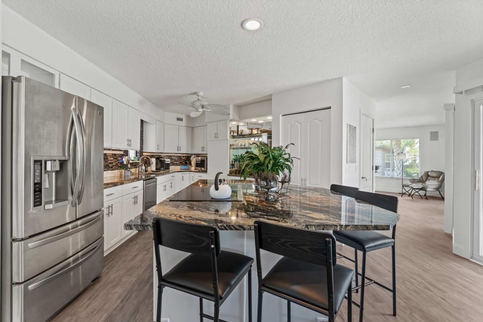 Modern kitchen with island seating.