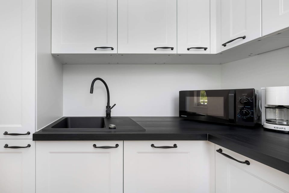 The kitchenette's practical layout maximizes space and functionality.