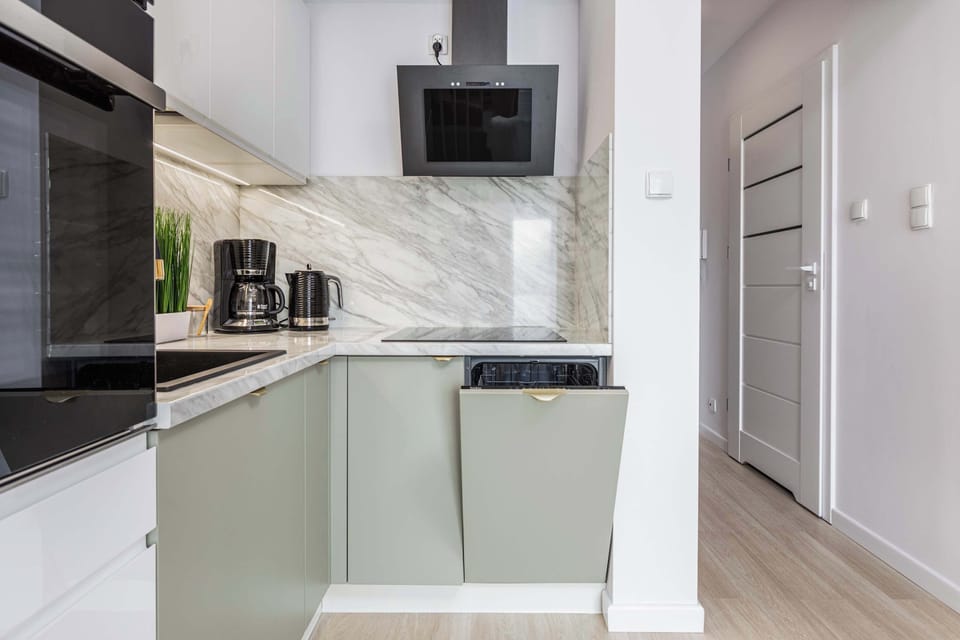 A modern kitchenette with high-quality appliances that ensure you can prepare home-cooked meals.