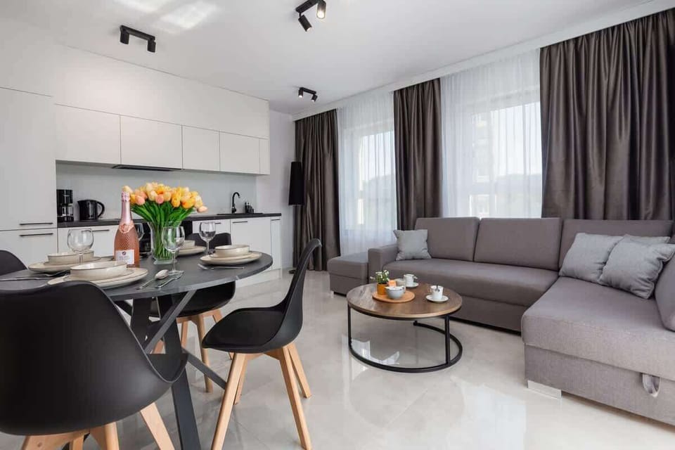 Kitchenette with oven and refrigerator. 