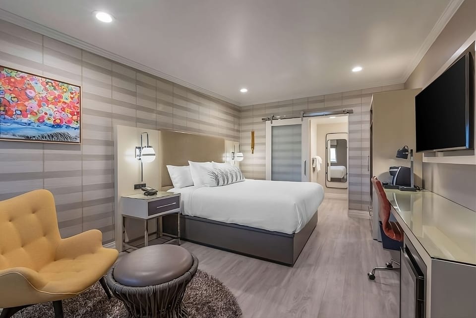 Stretch out in a bright, modern room with inviting seating.