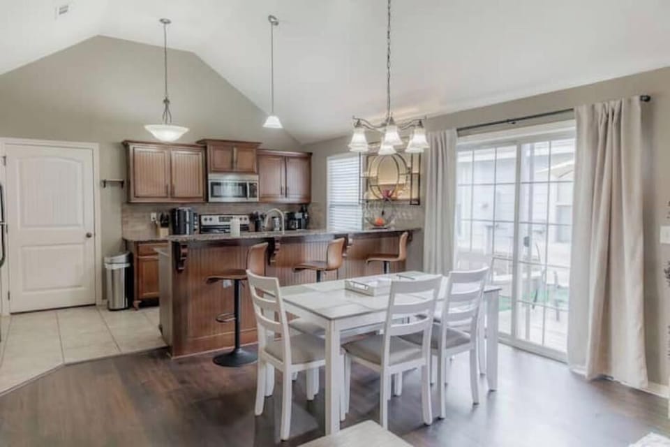 Spacious, well equipped Kitchen and room to eat at the bar and the table for 6.
