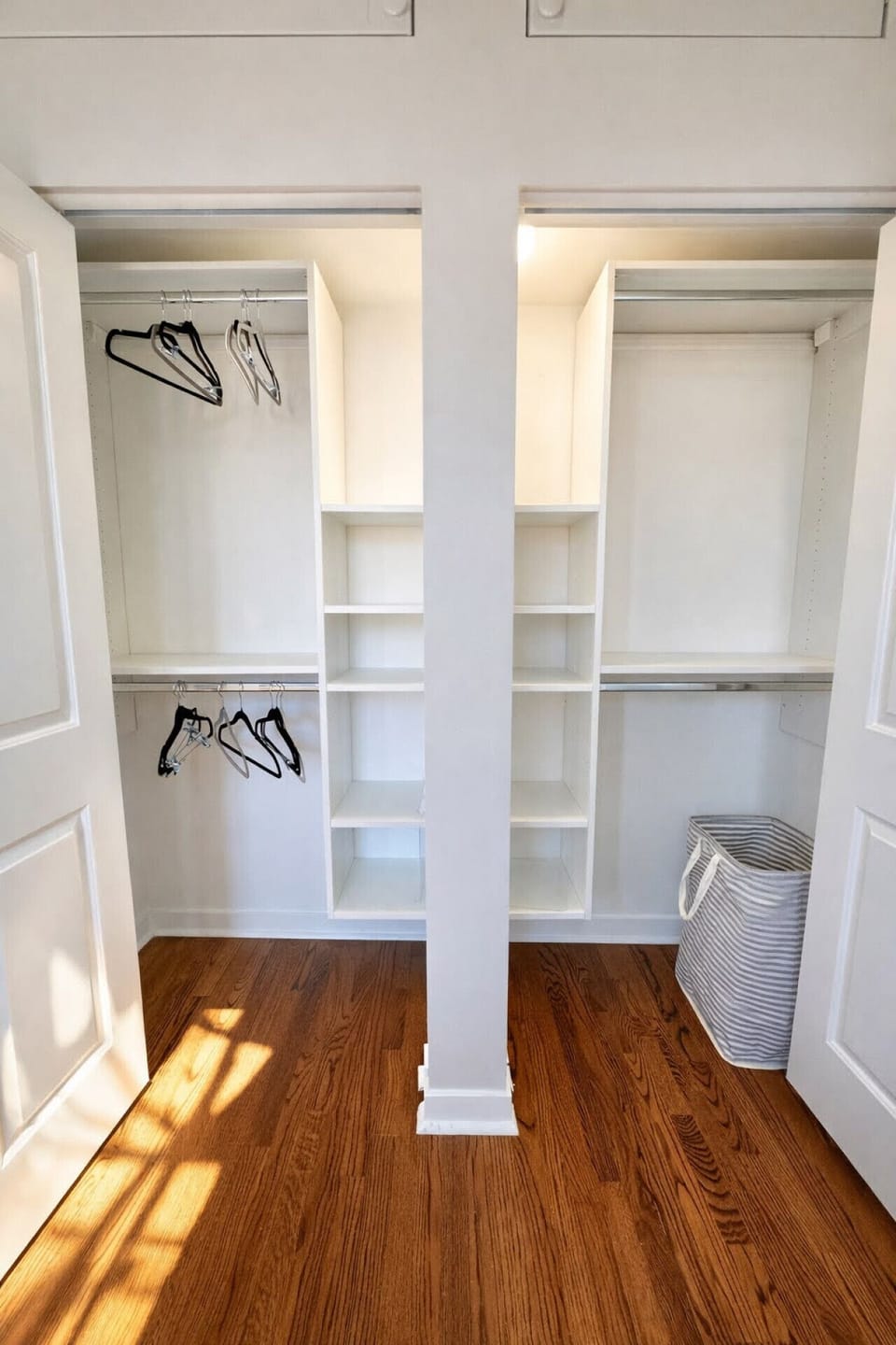 Serene nights in the primary suite, featuring a queen-sized bed and spacious wardrobe