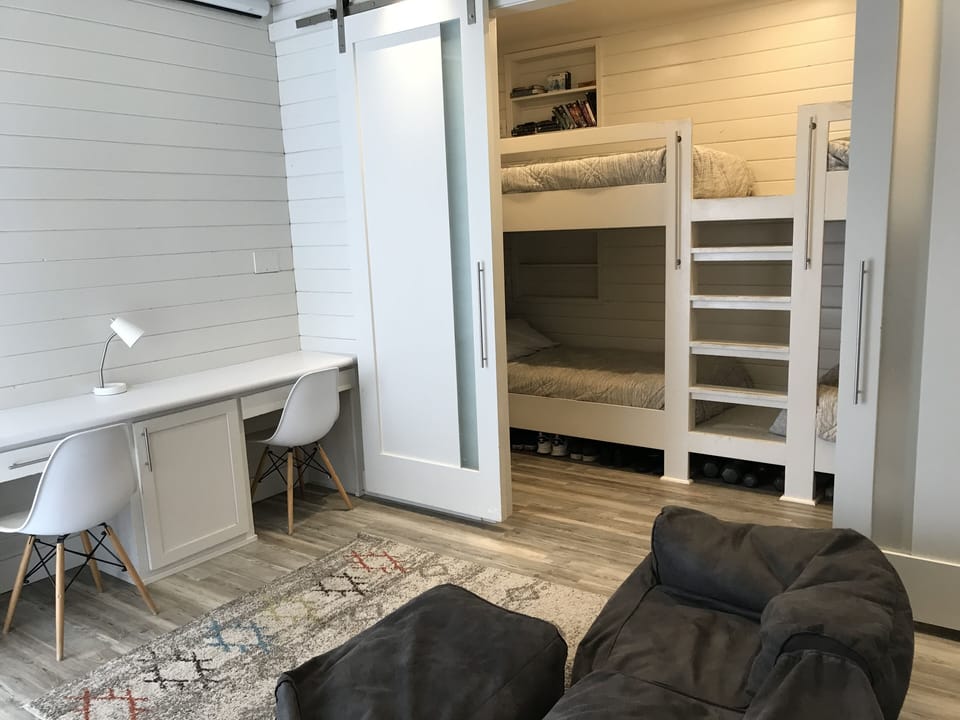 Large space with 4 twin beds , closets , desks, laundry room, and full bathroom