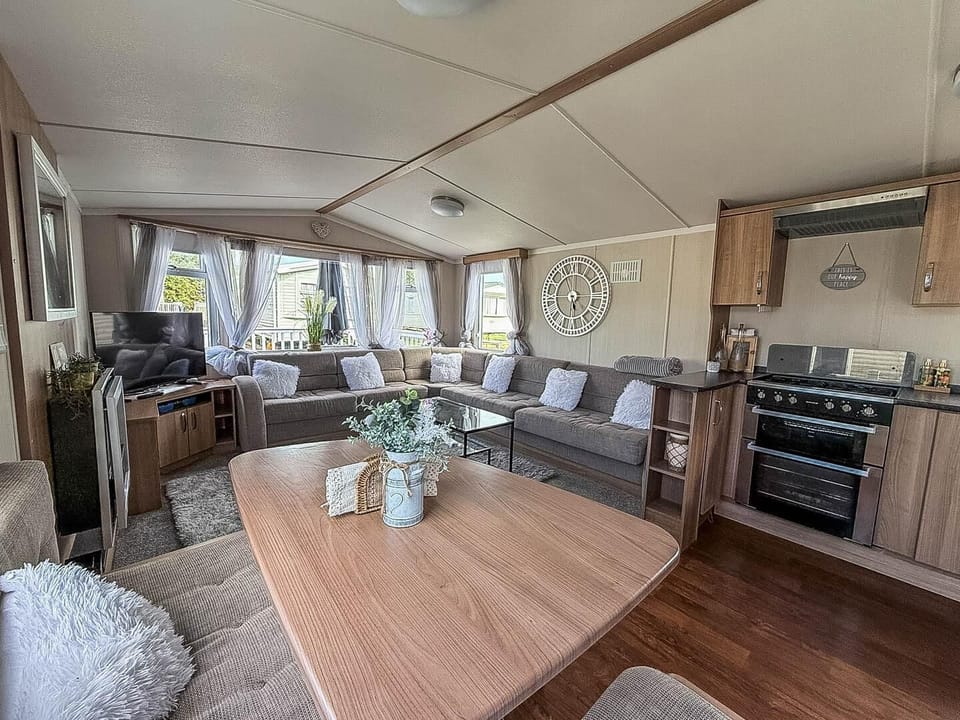 This expansive area seamlessly connects the kitchen, dining, and lounge areas, creating a wonderfully social and inviting atmosphere for everyone.