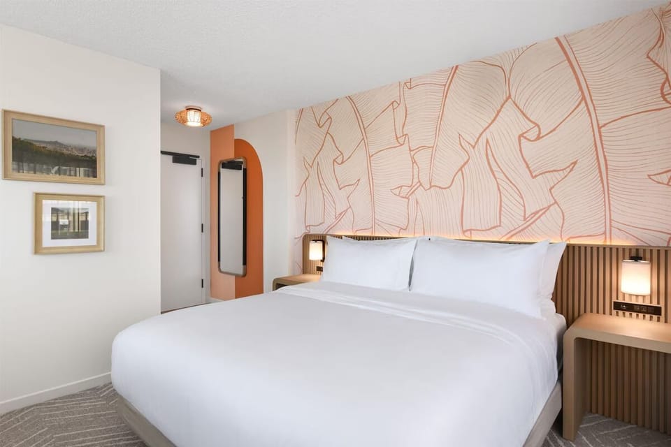 Drift off easily in crisp linens and serene modern décor.