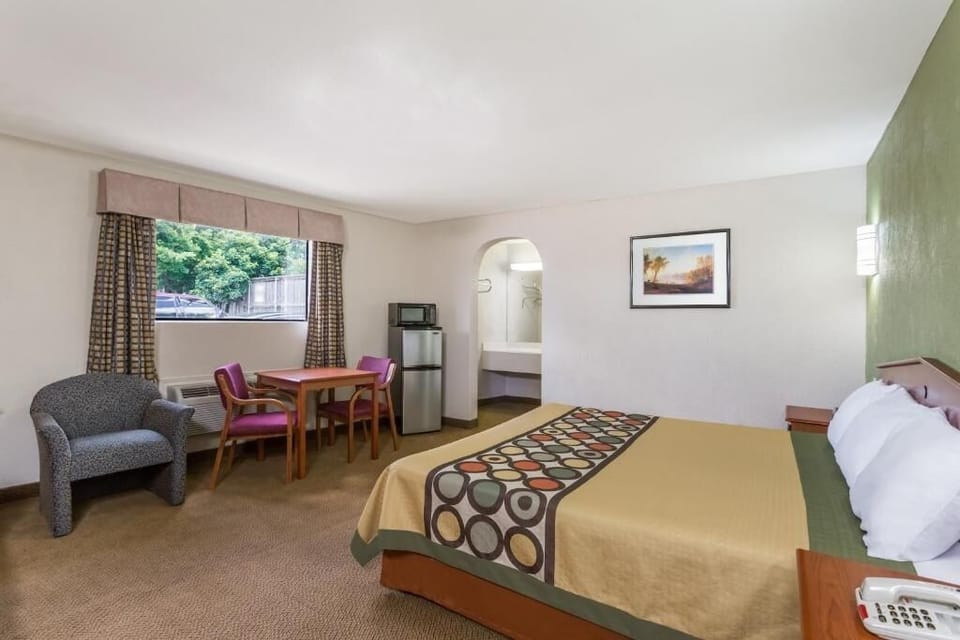 Stretch out in a bright room with dining nook.