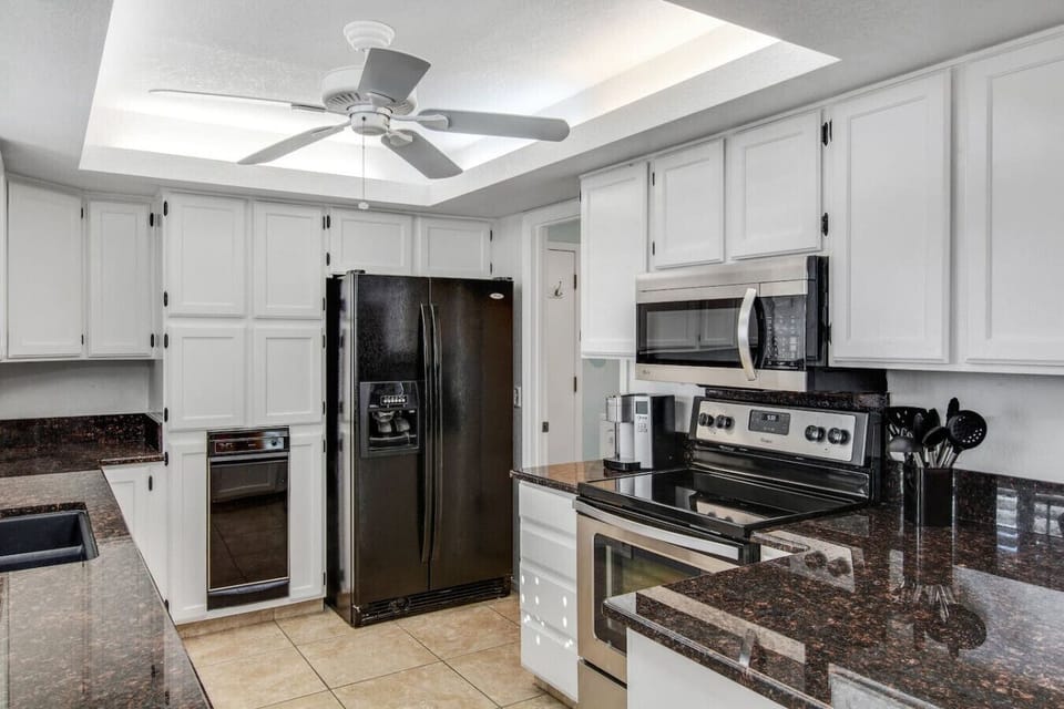 Fully equipped kitchen with modern appliances.