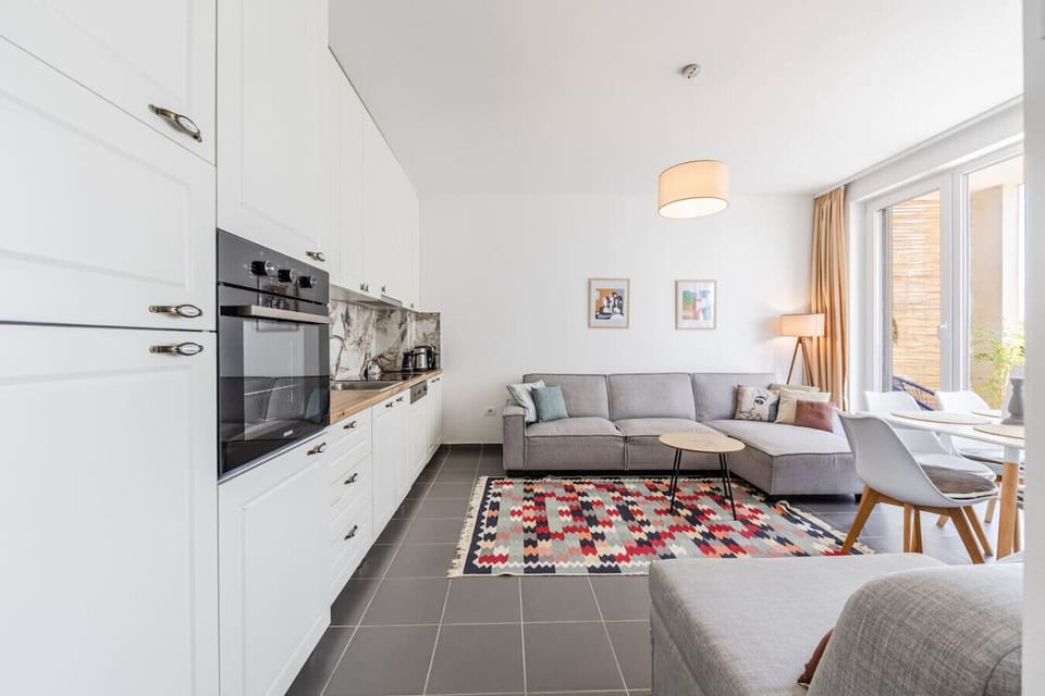 Living room and fully-equipped kitchen